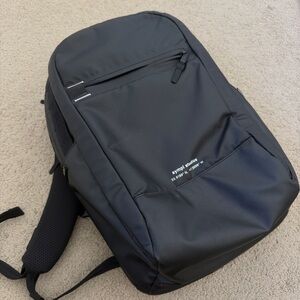 Sympl Studios black travel backpack